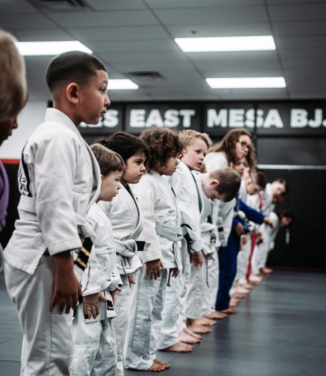 Kids lining up for class at Ares East Mesa